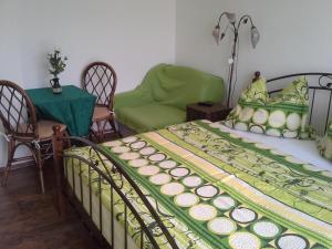 Łóżko lub łóżka w pokoju w obiekcie Vila Patricie