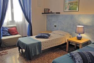 Postel nebo postele na pokoji v ubytování B&B Blue Home