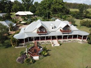 an aerial view of a large house with a roof at Clarence River Bed & Breakfast in Grafton