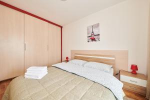 Postel nebo postele na pokoji v ubytování Apartment Vita Moela 23 & 24