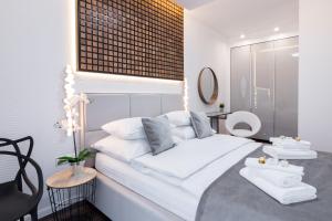 Posteľ alebo postele v izbe v ubytovaní GA Luxury Apartments W19 + 19 fotografií