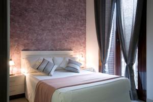 Postel nebo postele na pokoji v ubytování Aparthotel Rambla108