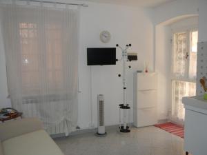 A television and/or entertainment centre at Casa Mari