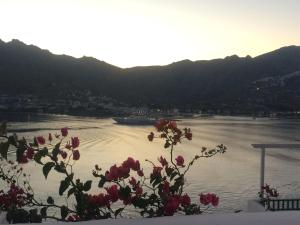 a view of a river with a boat in it at Astrio Suites in Livadi