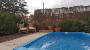 Bazén v ubytování Hotel Pat'ta Hoiri nebo v jeho okolí