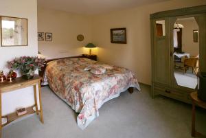 Tempat tidur dalam kamar di De Traverse