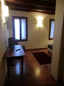A bed or beds in a room at Valentino b&b