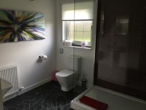 Koupelna v ubytování La Fortuna Lodges + 37 fotografií