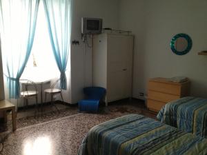 Postel nebo postele na pokoji v ubytování B&B Blue Home