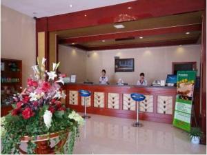The lobby or reception area at GreenTree Inn Rizhao West Station Suning Plaza