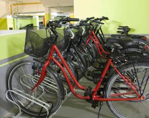 a row of bikes parked next to each other at Vincci Zaragoza Zentro in Zaragoza