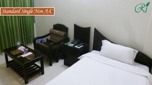 Restinn Hotel客房内的一张或多张床位