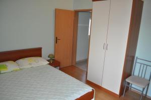 Postel nebo postele na pokoji v ubytování Apartments Zora