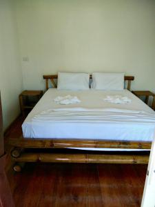 Postel nebo postele na pokoji v ubytování Mook Montra Resort Sea Front