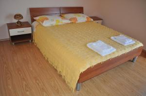 Postel nebo postele na pokoji v ubytování Apartments Zora