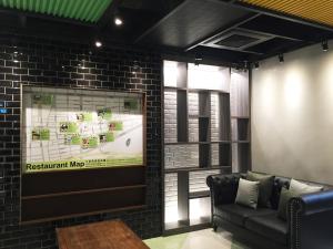 Area soggiorno di Green World Triple Beds