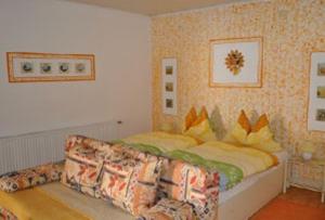 Кровать или кровати в номере Arkadenhof Kurtz