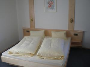 Postel nebo postele na pokoji v ubytování Haus Lindner