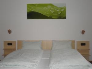 Postel nebo postele na pokoji v ubytování Haus Lindner