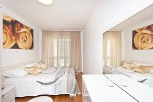 Postel nebo postele na pokoji v ubytování Dubrovnik Style Luxury Apartment