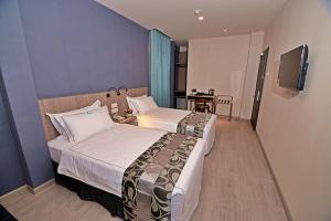Postel nebo postele na pokoji v ubytování Diamond Inn