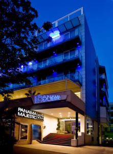 a building with a sign in front of it at Hotel Panama Majestic in Rimini