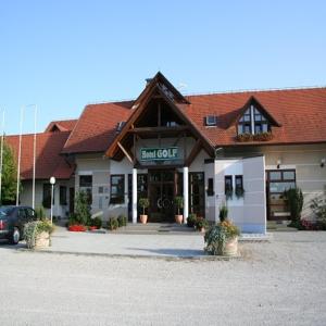 a large building with a sign that reads hotel at Hotel Golf in Donji Vidovec