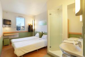 Koupelna v ubytování First Inn Hotel + 29 fotografií