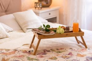 Posteľ alebo postele v izbe v ubytovaní Apartments & Rooms Perla