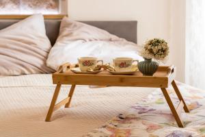 Posteľ alebo postele v izbe v ubytovaní Apartments & Rooms Perla