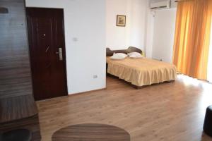Postel nebo postele na pokoji v ubytování Hotel Corsar