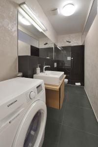 Bilik mandi di Charming & Cozy Ambiente Apartments