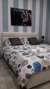 A bed or beds in a room at B&B A casa dell'artista