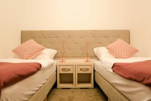 Postel nebo postele na pokoji v ubytování Apartament Esja