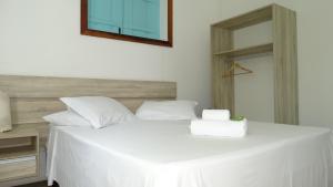 Postel nebo postele na pokoji v ubytování Atobá Villas