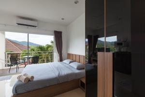 Katil atau katil-katil dalam bilik di Number 4 Phuket
