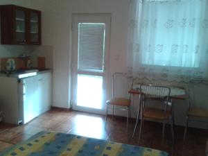 Kuchyňa alebo kuchynka v ubytovaní Apartmany u Smreka