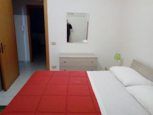 Ένα ή περισσότερα κρεβάτια σε δωμάτιο στο Halicia Vacanze