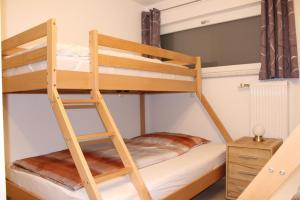 Postel nebo postele na pokoji v ubytování Familienapartment Sunnseitn
