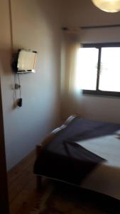 Postel nebo postele na pokoji v ubytování Apartments and Rooms Ana Pomer 217