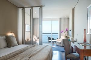Postel nebo postele na pokoji v ubytování VidaMar Resort Hotel Madeira