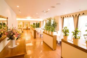 Reštaurácia alebo iné gastronomické zariadenie v ubytovaní Tokyo Grand Hotel
