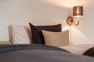 A bed or beds in a room at Chalet Hafling Leckplått