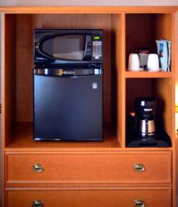 A kitchen or kitchenette at The Hospitality Inn