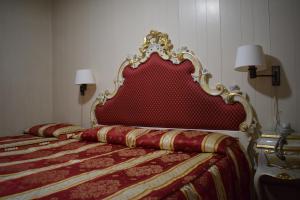 Letto o letti in una camera di Albergo Basilea