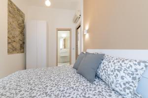 Posteľ alebo postele v izbe v ubytovaní Sweet Taormina Apartment