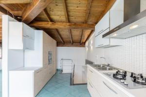 Kuchyňa alebo kuchynka v ubytovaní Sweet Taormina Apartment