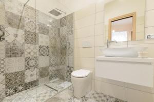Kúpeľňa v ubytovaní Sweet Taormina Apartment + 19 fotografií