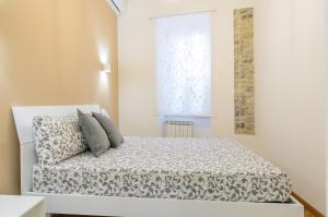 Postel nebo postele na pokoji v ubytování Sweet Taormina Apartment
