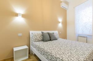 Posteľ alebo postele v izbe v ubytovaní Sweet Taormina Apartment